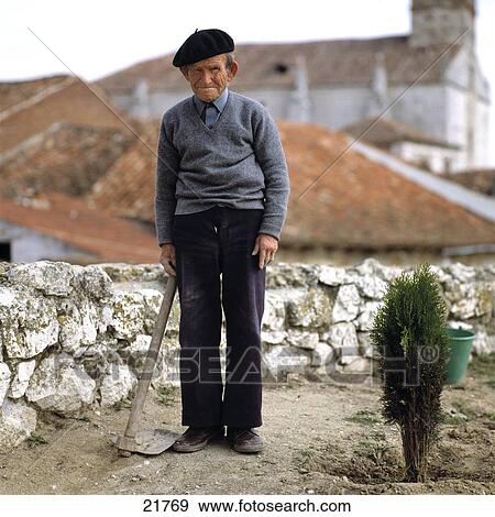 Old man with hoe in garden, Simancas, Valladolid, Castilla Y Leon, Spain View Large Photo Image Stock Photo - Old man with hoe in garden, Simancas, Valladolid, Castilla Y Leon, Spain . Fotosearch