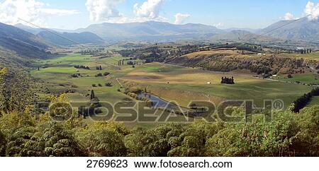 Panoramic view of mountain range, Crown Range, Queenstown, South Island New Zealand, New Zealand View Large Photo Image Stock Image - Panoramic view of mountain range, Crown Range, Queenstown, South Island New Zealand, New Zealand . Fotosearch
