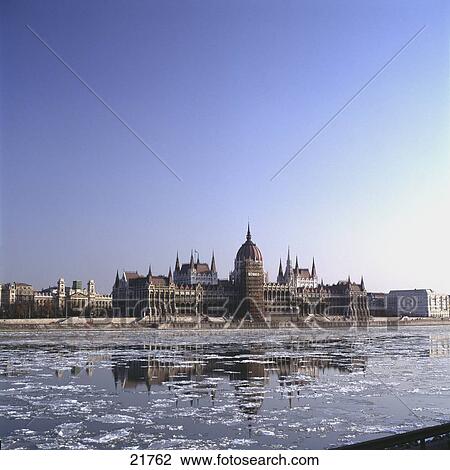 Parliament building at riverside, Danube River, Budapest, Hungary View Large Photo Image Stock Image - Parliament building at riverside, Danube River, Budapest, Hungary . Fotosearch