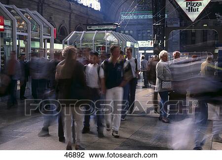 Stock Image - Passengers at platform, Frankfurt, Hesse, Germany . Fotosearch