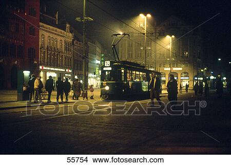 Picture - People at market square at night, Basel, Switzerland . Fotosearch