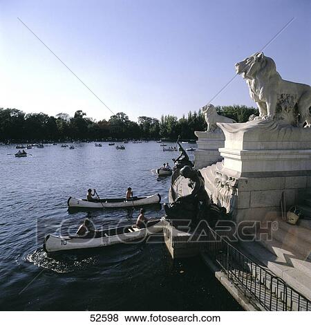 Stock Photo - People boating in lake, El Estanque, Parque Del Buen Retiro, Madrid, Spain . Fotosearch