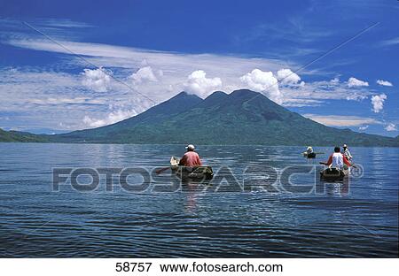 Stock Photo - People fishing in lake, Lake Atitlan, Guatemala . Fotosearch