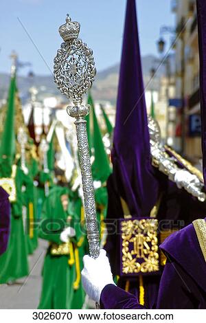 Stock Image - People holding a holy symbol, Malaga, Spain . Fotosearch