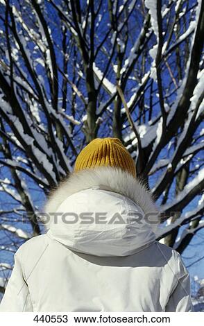 Person wearing bonnet and winter coat, rear view View Large Photo Image Stock Image - Person wearing bonnet and winter coat, rear view . Fotosearch