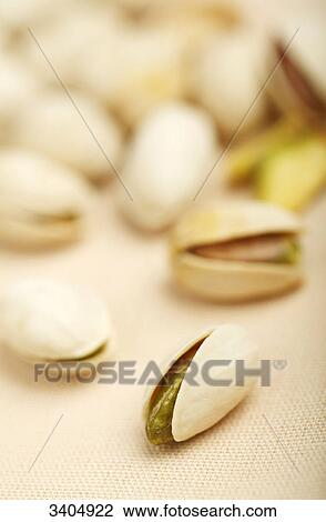 Stock Image - Pistachio nuts, close-up . Fotosearch