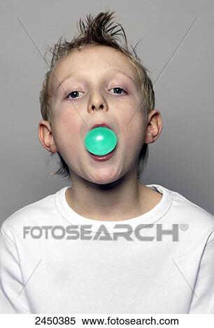Portrait of boy blowing chewing gum View Large Photo Image Stock Photography - Portrait of boy blowing chewing gum . Fotosearch