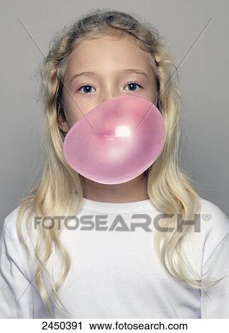 Stock Image - Portrait of girl blowing chewing gum . Fotosearch