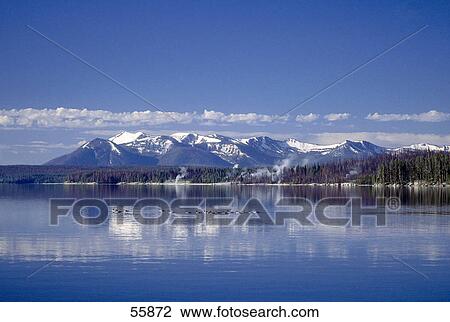 Reflection of mountains in lake, Yellowstone Lake, Yellowstone National Park, Wyoming, USA View Large Photo Image Stock Image - Reflection of mountains in lake, Yellowstone Lake, Yellowstone National Park, Wyoming, USA . Fotosearch