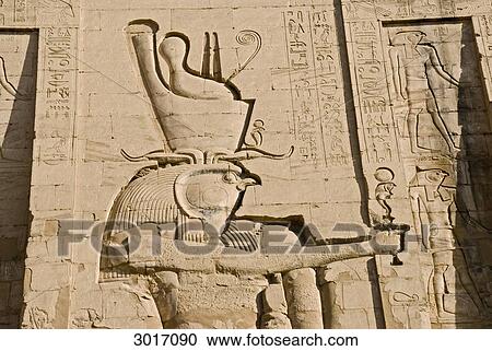 Stock Image - Relief on the wall of the Temple of Horus, Edfu, Egypt, close-up . Fotosearch