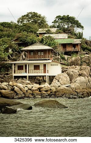 Stock Photograph - Residential buildings on the coast of Ko Tao, Thailand . Fotosearch