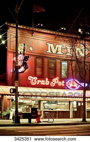Stock Image - Restaurant in Seattle at night, USA . Fotosearch