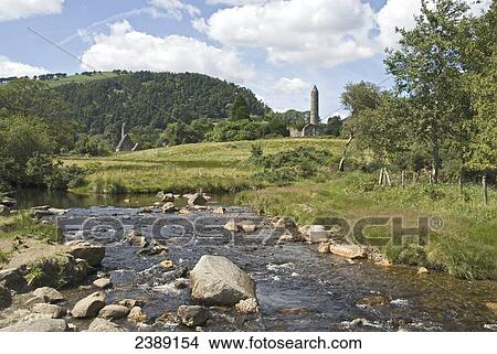Picture - River flowing through landscape, Glenealo River, Ireland . Fotosearch