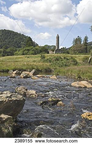 Stock Photography - River flowing through landscape, Glenealo River, Ireland . Fotosearch