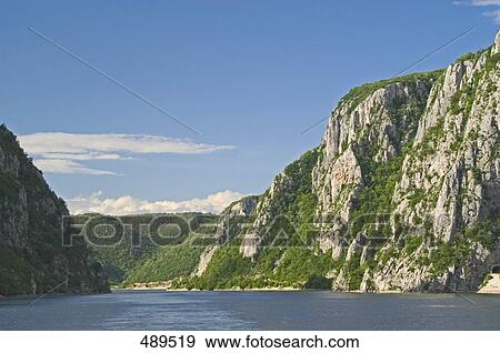 River flowing through mountains, Danube River, Serbia View Large Photo Image Stock Photo - River flowing through mountains, Danube River, Serbia . Fotosearch