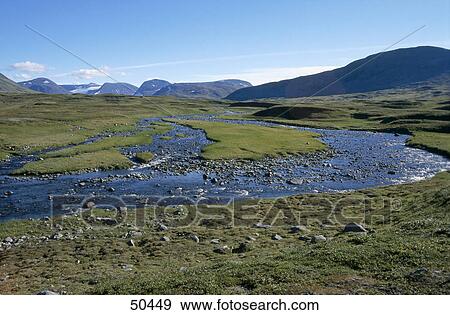 Stock Photo - River passing through landscape, Sjnjuftjutisjakka River, Sarek National Park, Sweden . Fotosearch