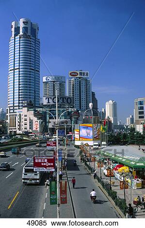 Road with skyscrapers in city, Shanghai, China View Large Photo Image Stock Photography - Road with skyscrapers in city, Shanghai, China . Fotosearch