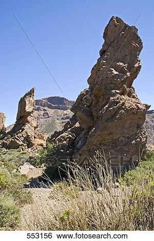 Stock Photograph - Rock formations on volcanic landscape, Roque De La Grieta, El Teide National Park, Tenerife, Canary Islands, Spain . Fotosearch