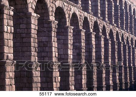 Stock Photo - Roman Aqueduct in city, Segovia, Spain . Fotosearch