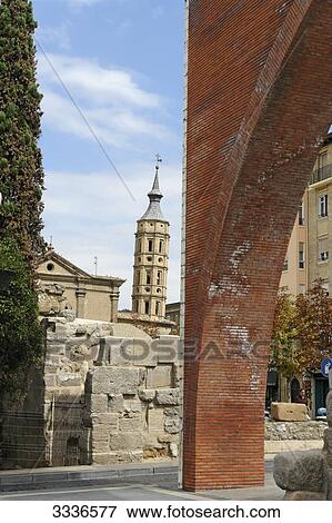 Ruins of a roman city wall, San Juan de los Panetes Church in the background, Zaragoza, Spain View Large Photo Image Stock Photo - Ruins of a roman city wall, San Juan de los Panetes Church in the background, Zaragoza, Spain . Fotosearch