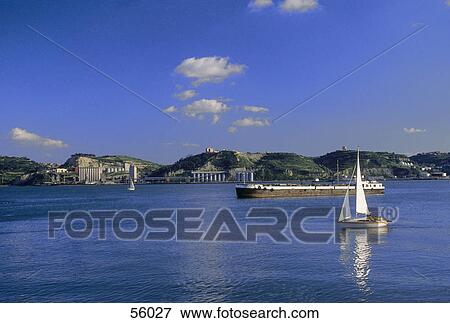 Sailboat in Tagus river, Lisbon, Portugal, Europe View Large Photo Image Stock Photo - Sailboat in Tagus river, Lisbon, Portugal, Europe . Fotosearch