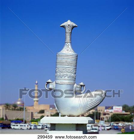 Sculpture in city against blue sky, Nizwa, Oman View Large Photo Image Stock Photo - Sculpture in city against blue sky, Nizwa, Oman . Fotosearch
