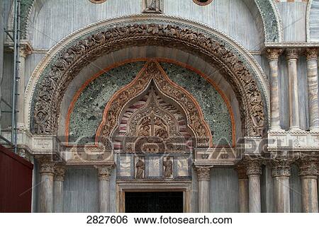 Stock Photograph - Sculptures carved on wall of mansard, Venice, Veneto, Italy . Fotosearch