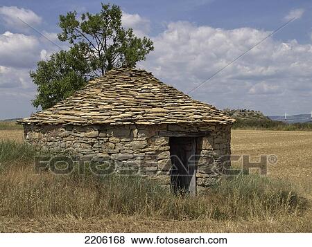 Stock Photo - Sheep shelter in field, Midi Pyrenees, France . Fotosearch