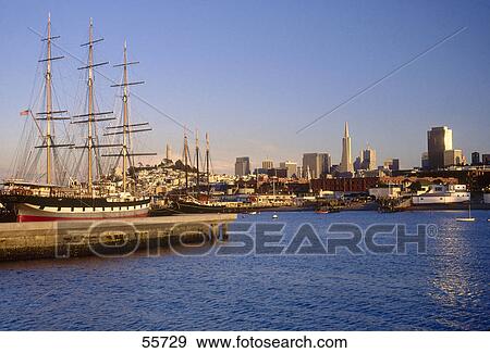 Stock Photo - Ship at museum with city skyline in background, Maritime Museum, San Francisco, California, USA . Fotosearch