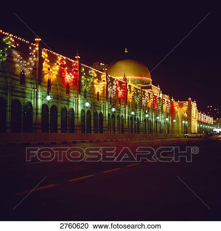 Shopping mall lit up at night, Al Majarra Souq, Sharjah, United Arab Emirates View Large Photo Image Stock Image - Shopping mall lit up at night, Al Majarra Souq, Sharjah, United Arab Emirates . Fotosearch