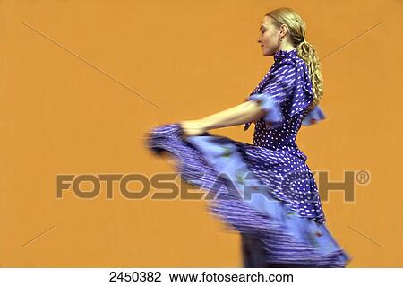 Side profile of female flamenco dancer dancing View Large Photo Image Stock Image - Side profile of female flamenco dancer dancing . Fotosearch