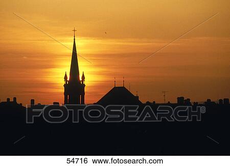 Stock Photograph - Silhouette of buildings at sunset, Bern, Switzerland . Fotosearch