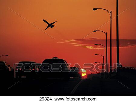 Silhouette of cars moving on road, Miami Beach, Florida, USA View Large Photo Image Picture - Silhouette of cars moving on road, Miami Beach, Florida, USA . Fotosearch