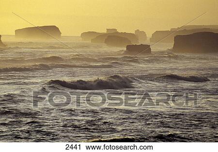 Silhouette of rock formations at sunset, Martyreous-Bay, Victoria, Australia View Large Photo Image Stock Image - Silhouette of rock formations at sunset, Martyreous-Bay, Victoria, Australia . Fotosearch