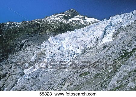 Snow covered mountain range, Rhone Glacier, Switzerland View Large Photo Image Stock Photo - Snow covered mountain range, Rhone Glacier, Switzerland . Fotosearch