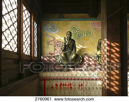 Stock Image - Statue in Buddhist temple, Beihai Park. Beijing, China . Fotosearch