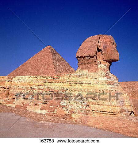 Statue in front of pyramid, Sphinx De Gizeh, Cairo, Egypt View Large Photo Image Stock Photo - Statue in front of pyramid, Sphinx De Gizeh, Cairo, Egypt . Fotosearch