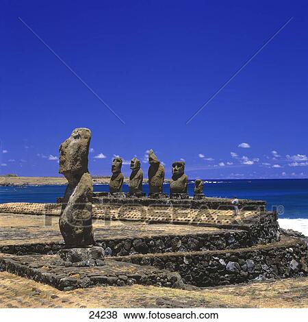 Statues in row on coast, Moai Statue, Easter Island, Chile View Large Photo Image Stock Photo - Statues in row on coast, Moai Statue, Easter Island, Chile . Fotosearch