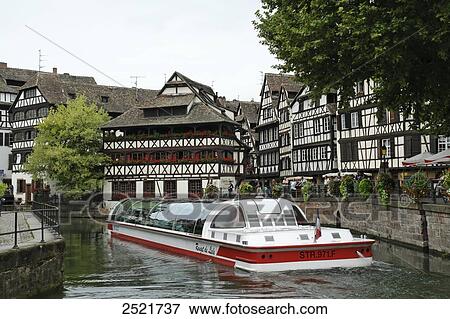 Steamboat moving in canal, Maison Des Tanneurs, Petite-France, Strasbourg, Bas-Rhin, Alsace, France View Large Photo Image Stock Photo - Steamboat moving in canal, Maison Des Tanneurs, Petite-France, Strasbourg, Bas-Rhin, Alsace, France . Fotosearch