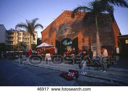 Stock Photo - Street scene in city at sunset, Key West, Florida, USA . Fotosearch