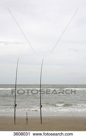 Surf fishing on the beach of Texel, Netherlands View Large Photo Image Stock Image - Surf fishing on the beach of Texel, Netherlands . Fotosearch