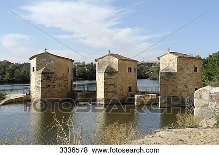Three oil mills on the river bank, Zamora, Spain View Large Photo Image Stock Photo - Three oil mills on the river bank, Zamora, Spain . Fotosearch