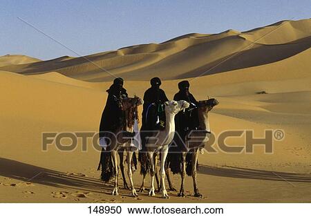 Three tuareg riders on camels, Sahara Tekerkiba, Lybia View Large Photo Image Stock Image - Three tuareg riders on camels, Sahara Tekerkiba, Lybia . Fotosearch