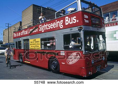 Tourist bus on road, Toronto, Ontario, Canada View Large Photo Image Stock Photo - Tourist bus on road, Toronto, Ontario, Canada . Fotosearch