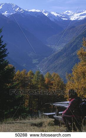 Stock Photo - Tourist resting in forest, Eschtal valley, Alto Adige, Italy . Fotosearch