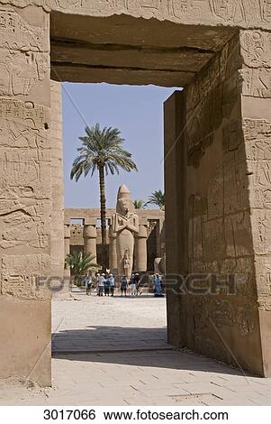 Stock Photograph - Tourists at the Temple of Karnak, Luxor, Egypt . Fotosearch