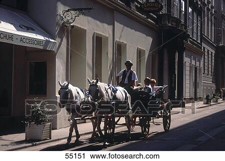 Tourists in horse carriage, Vienna, Austria View Large Photo Image Stock Image - Tourists in horse carriage, Vienna, Austria . Fotosearch