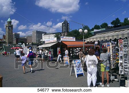 Stock Photo - Tourists in market, Port of Hamburg, Hamburg, Germany . Fotosearch