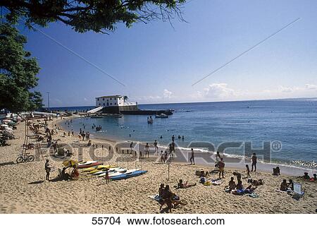 Picture - Tourists on the beach, Porto da Barra Beach, Salvador, Bahia, Brazil . Fotosearch