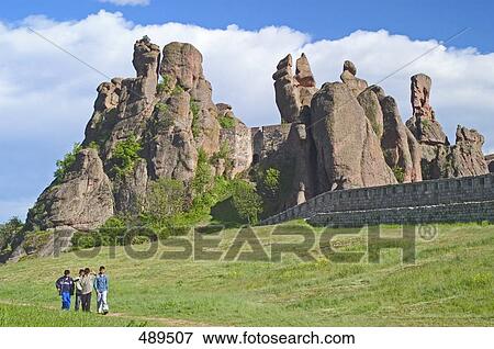 Tourists with castle on hill, Belogradchik Fortress, Belogradchik, Vidin, Romania View Large Photo Image Stock Photo - Tourists with castle on hill, Belogradchik Fortress, Belogradchik, Vidin, Romania . Fotosearch